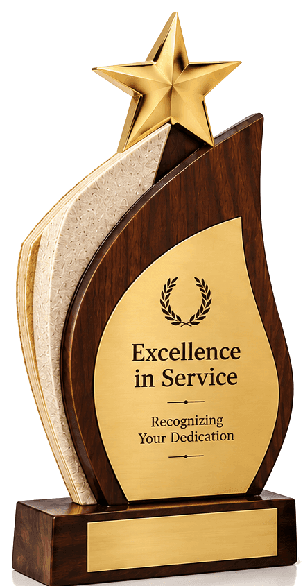 Flame-shaped walnut trophy topped with a gold star, gold plate engraved “Excellence in Service”